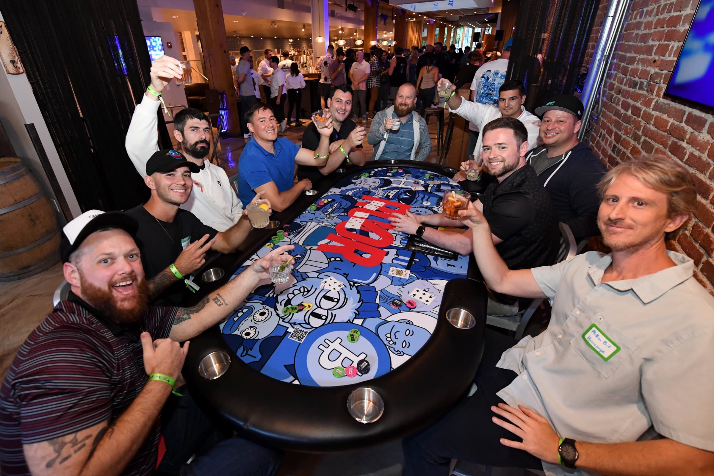Builders gathered around a poker table at a Builders Poker event.